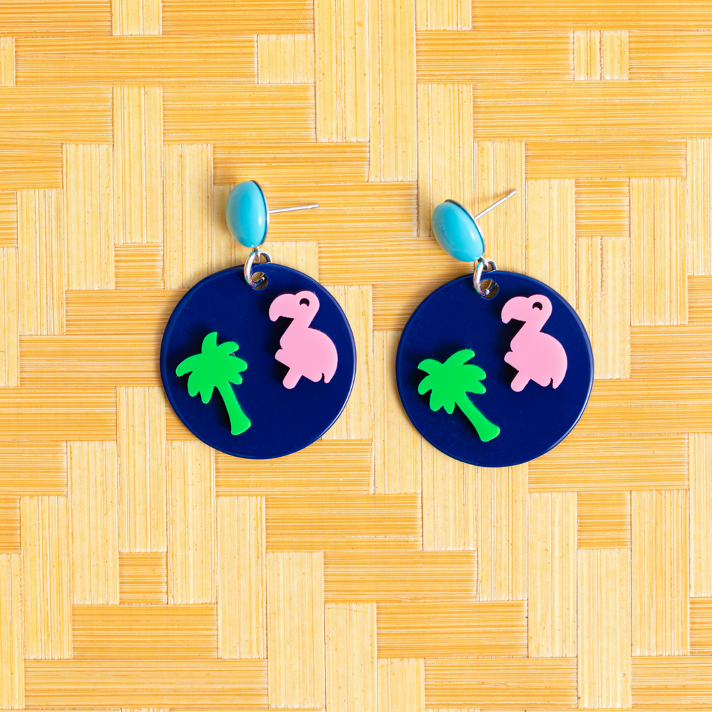 womens navy blue circle earrings with pink flamingos and palm trees katie bartelsand 